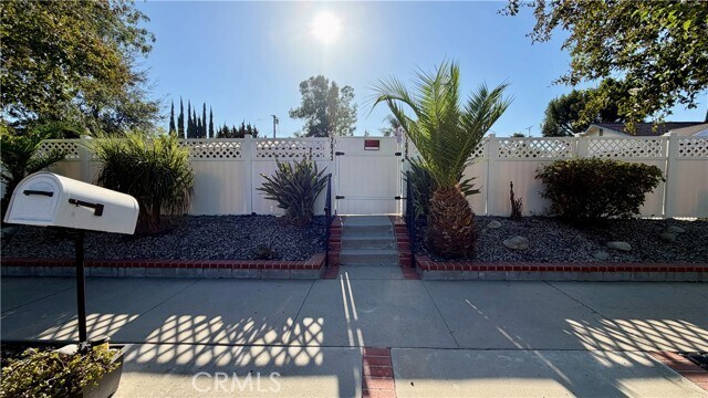 Building Photo - 7843 Woodlake Ave