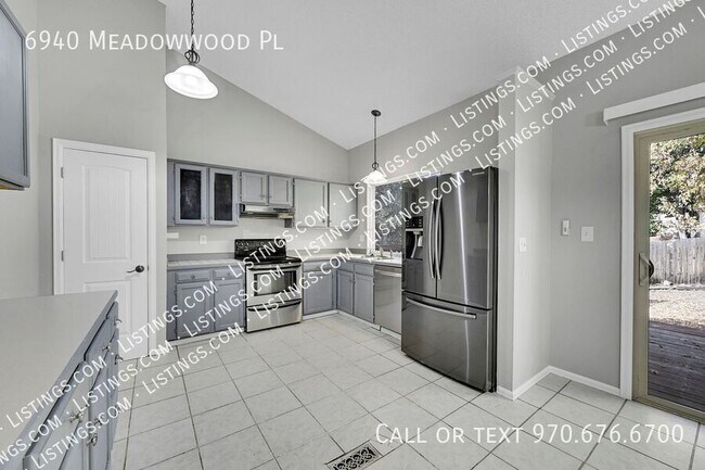 Building Photo - 6940 Meadowwood Pl