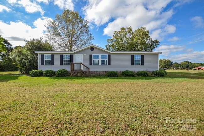 Building Photo - 711 W C J Thomas Rd