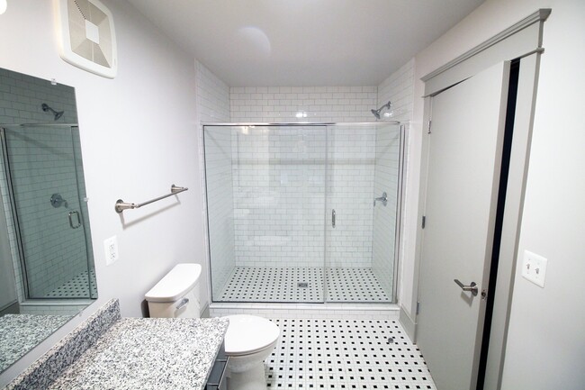 Porcelain Tile Bath Surrounds - The Quarters Apartments