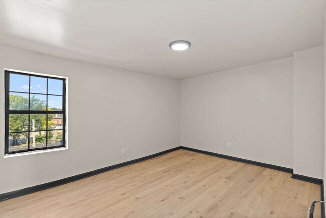 Building Photo - For Rent: Renovated 2-Story Townhouse in M...
