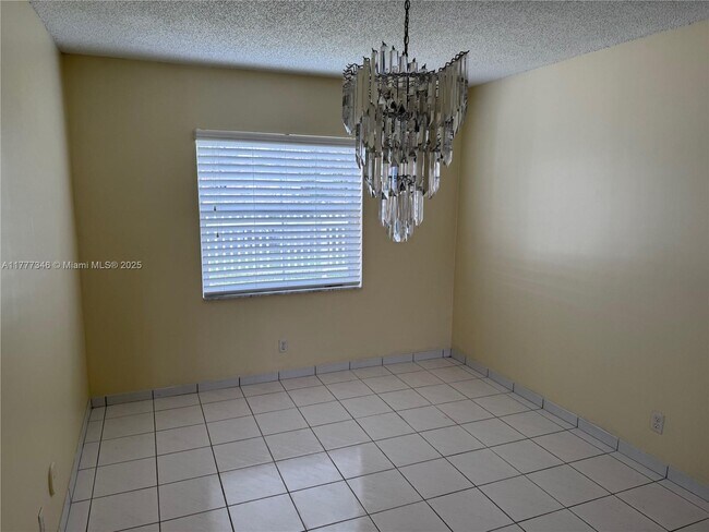 Building Photo - 9563 NW 52nd Ct
