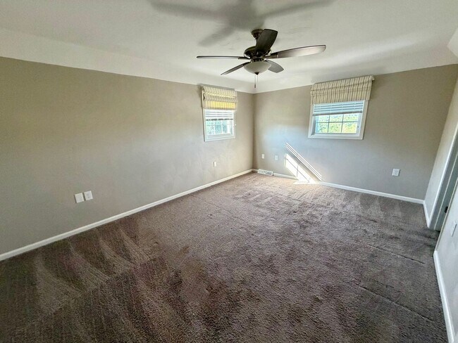 Building Photo - Modern Comforts Await: Spacious Rental with 2-Car Garage, Private Office, and Finished Basement w...
