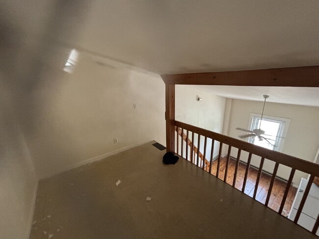 Building Photo - Charming Studio Loft Living with High Ceilings & Classic Hardwood Floors!