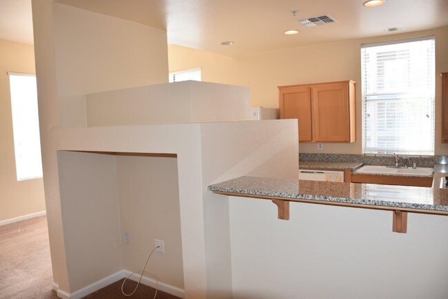 Building Photo - 2 Bedroom 3rd floor unit in Guard Gated Pa...