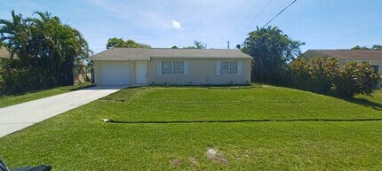 Building Photo - 2/2/1 home with a spacious fenced backyard...