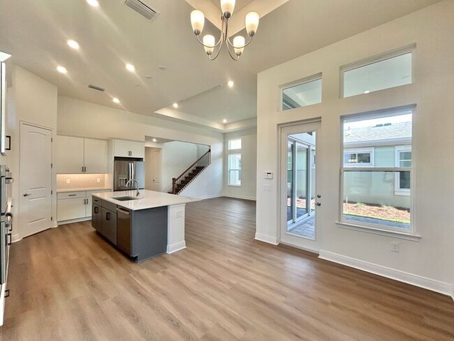 Building Photo - Gorgeous 4/3 Residence with a Private Back Lanai and a 3 Car Garage in the Delightful Laureate Pa...