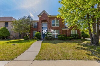 Building Photo - Recently Updated Plano Property with Modern Features and Serene Surroundings