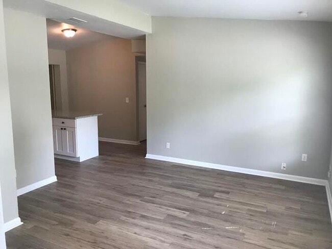 Building Photo - Spacious 4 Bedroom Home With Garage And Modern Updates