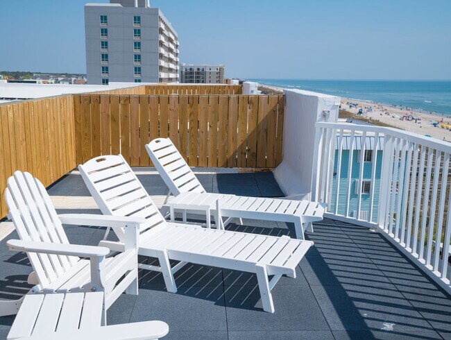 Building Photo - SPEND YOUR OFF-SEASON AT THIS TOP FLOOR OCEANFRONT CONDO