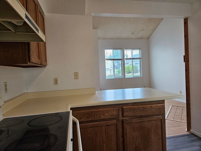 Building Photo - Adorable Loft Style One Bedroom Condo Steps from Buckley AFB