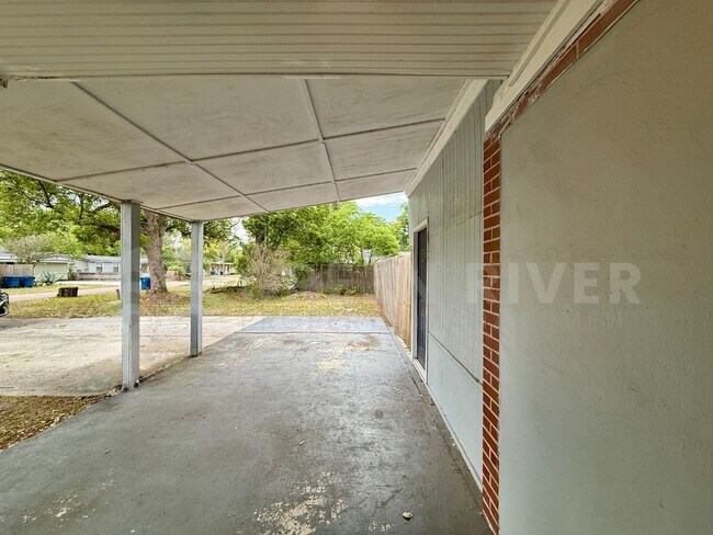 Building Photo - Fully Renovated 2BR Brick Home with Vaulted Ceilings & Backyard Retreat!