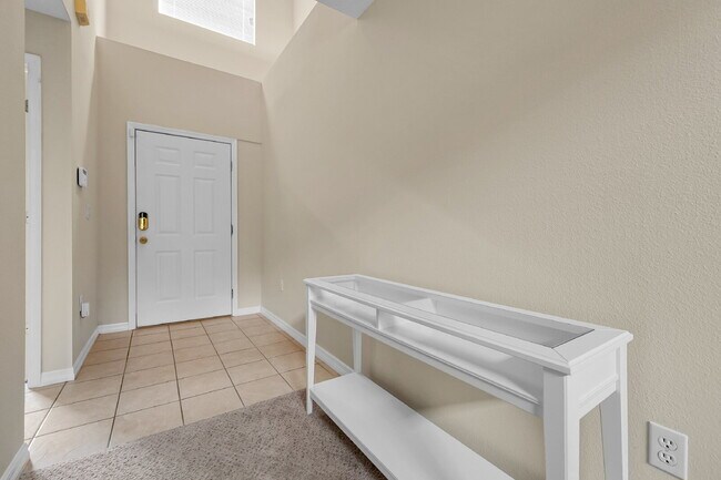 Building Photo - "Furnished 4-Bedroom Pool Home – Comfort and Style in Davenport"
