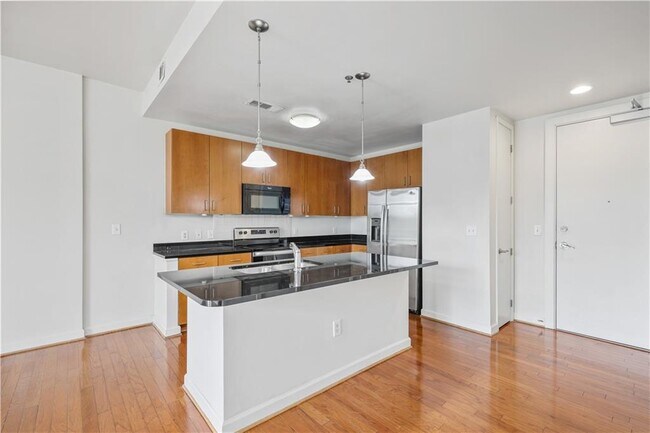Building Photo - 711 Cosmopolitan Dr NE