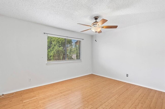 Building Photo - 8301 Greenslope Dr