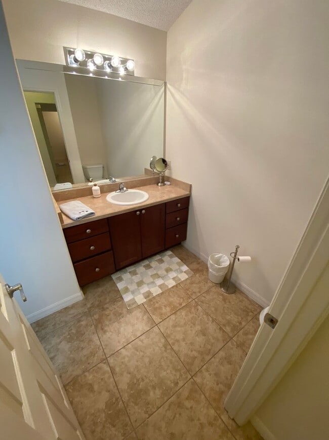 Building Photo - 6 Month or Longer Lease. Large 4 Bed + 4 1/2 Baths Home, w/Views of the Jacaranda Golf Course and...