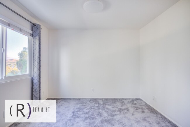 Building Photo - A Captivating and Charming 2 Story Home Ne...