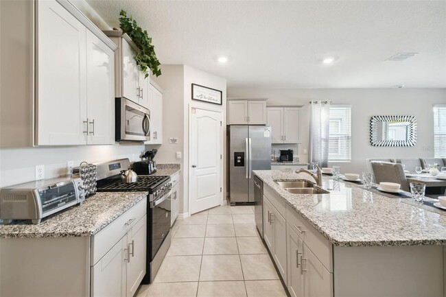 Building Photo - 7704 Oakmoss Loop