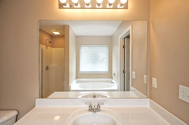 Building Photo - Former model home in highly sought after B...