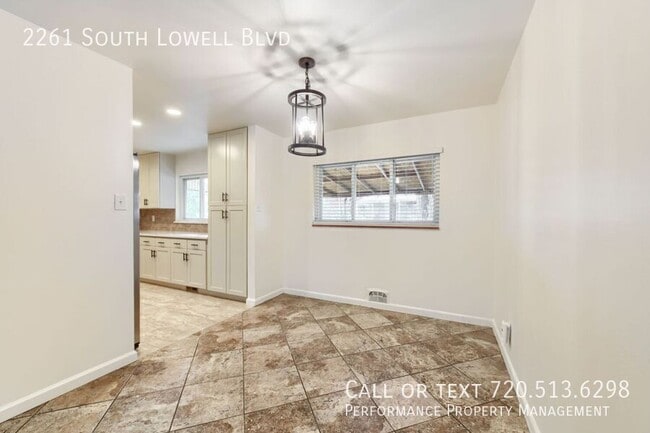 Building Photo - 2261 S Lowell Blvd