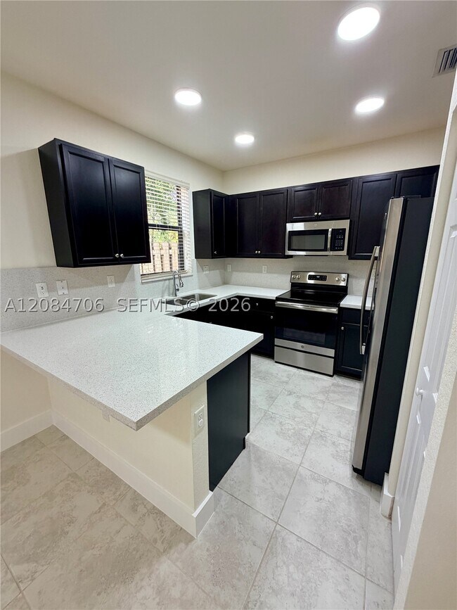 Building Photo - 6561 N Anise Ct