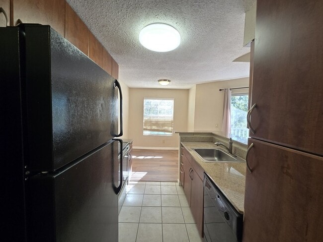 Building Photo - 1 Bed 1 Bath Third floor condo in Nice Community for Rent in Orlando $1349