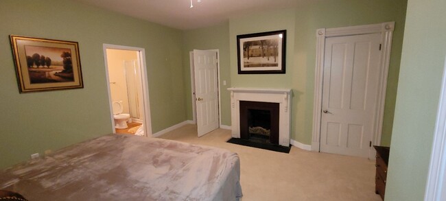 2nd bath and 2nd bedroom fireplace - 2451 Riverside Dr