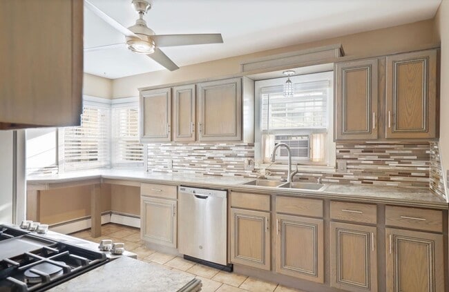 Building Photo - Designer-Inspired 3 Bedroom, 2 Bath Home With Finished Basement & In-Ground Pool