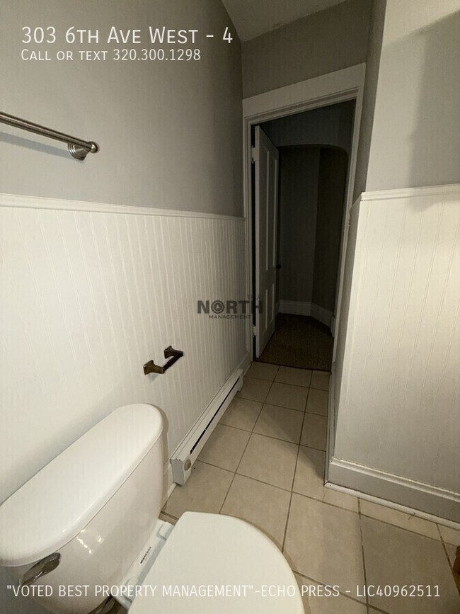 Building Photo - 303 6th Ave W