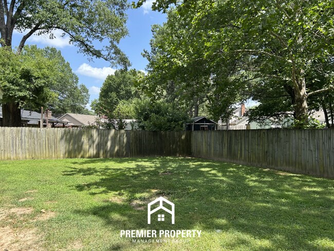 Building Photo - Stunning 3BR/2BA Near Southwind | 2,079 Sq Ft, Built-Ins, Fireplace & Covered Patio