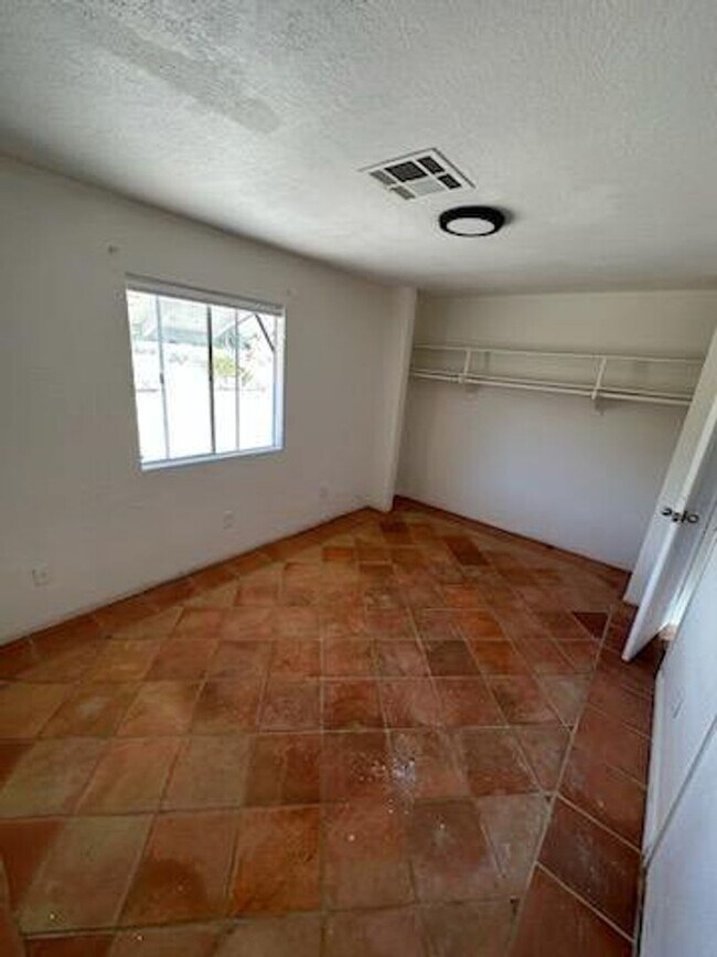 Building Photo - Well-maintained 2-bedroom, 1-bath home located near the 29 Palms Marine Base and Tortoise Rock Ca...