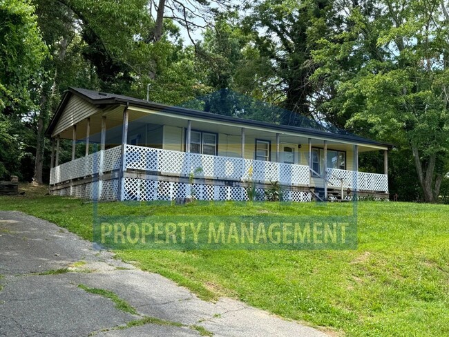 Building Photo - Two bedroom home w/ wrap-around porch!