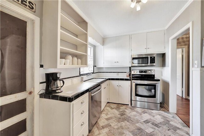 Building Photo - COMING IN JUNE! Location. Character. Charm. This one has it all!