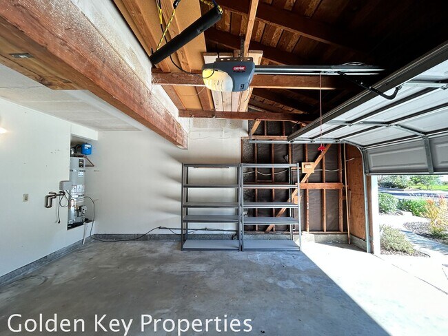 Building Photo - Welcome to this stunning 4-bedroom, 2.5-ba...