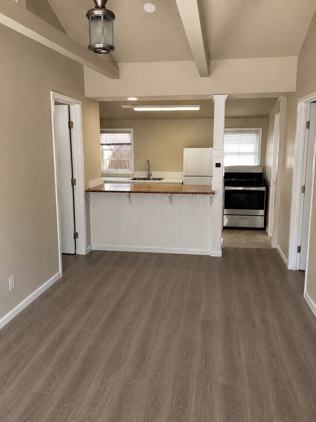 Building Photo - Available 6/25. Private rear unit, 5-minute walk to Cal Poly, parking included but no car needed.