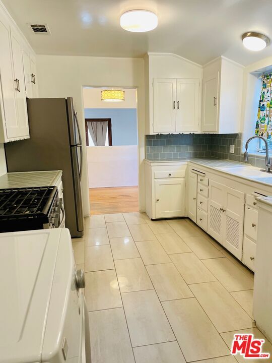 Building Photo - 5803 Irvine Ave