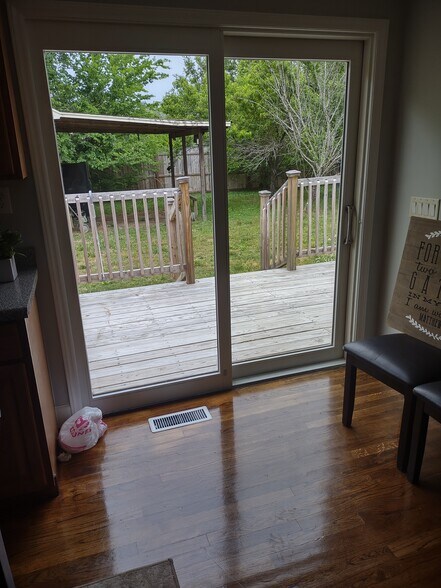 backyard/deck outside of kitchen - 1208 E Main St