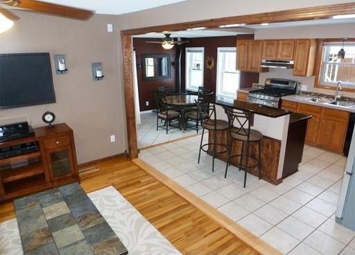 Living room view into kitchen/dining area - 203 Buckley Blvd