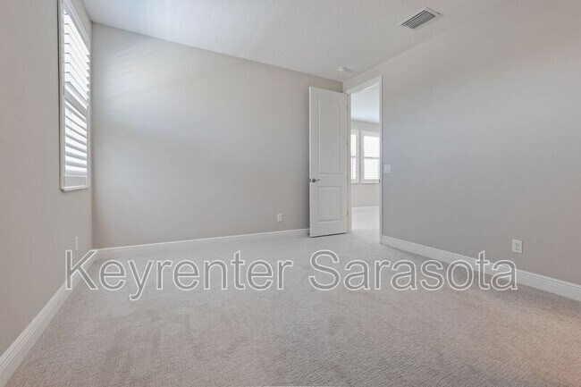 Building Photo - 6133 Lungo Lago Dr
