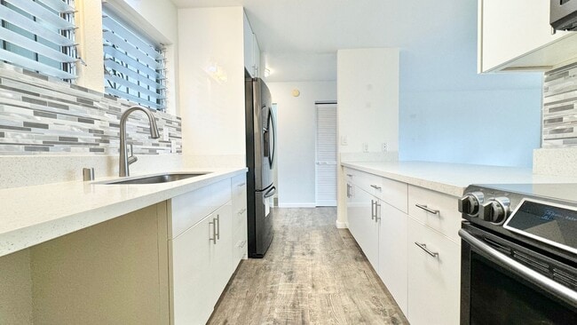 Building Photo - UPDATED 3 BEDROOM WITH 2 CAR GARAGE IN AIEA