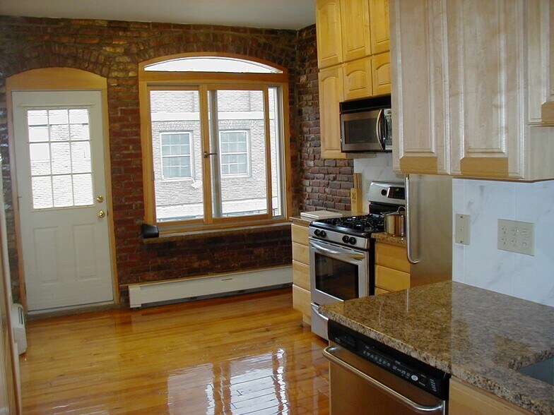 Brick kitchen facing city/Armory - 71 Baldwin St