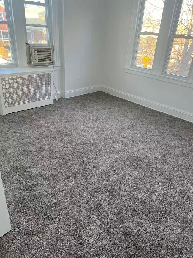 Building Photo - 204-06 42nd Ave