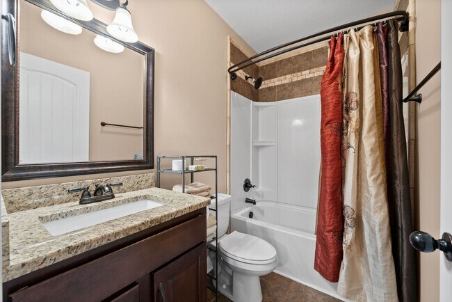 Building Photo - Move-In Special! Spacious 4-Bedroom Home w...
