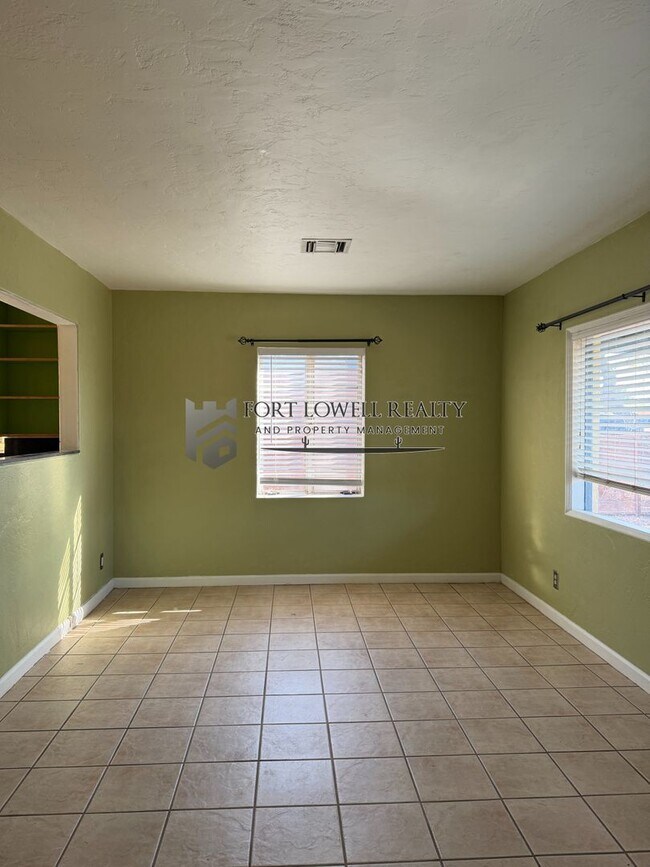 Building Photo - Welcome to this charming 2-bedroom, 1-bathroom + Den!