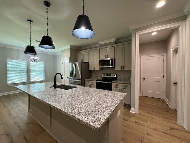 Building Photo - "Charming 4 Bed, 2 Bath Home with Granite ...