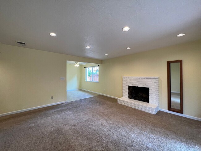 Building Photo - Spacious 1,196 Square Foot  4BR Home Across from Technology High School | Large Yard & 2-Car Garage"
