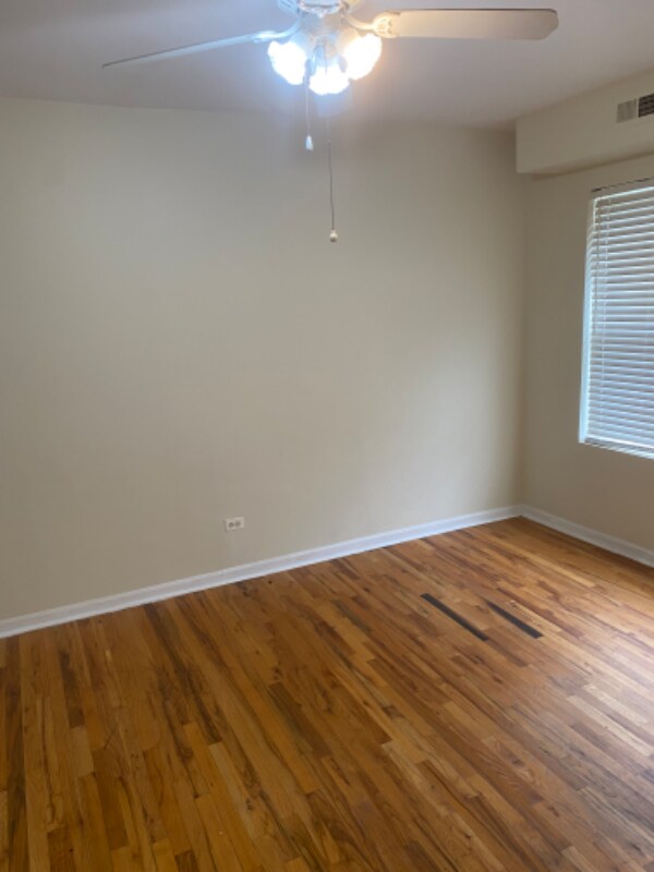 Building Photo - 1301 E 71st Pl