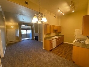 Building Photo - All NEW flooring in this spacious 3-bedroo...