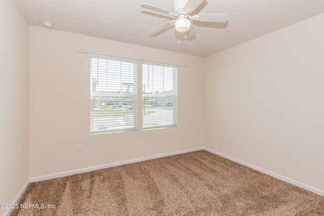 Building Photo - 15697 Saddled Charger Dr