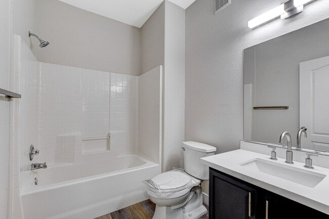 Building Photo - Upgraded First-Floor Condo in a Gated Summ...
